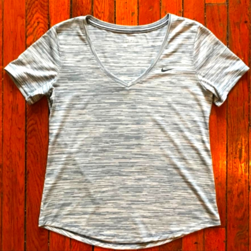 Women’s Nike Drifit Vneck light blue & white athletic shirt sleeve